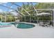 Enjoy the screened-in pool, patio, and outdoor seating at 9806 Bennington Dr, Tampa, FL 33626