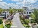 This attractive retail area features palm trees lining the street and parking in front of businesses at 9806 Bennington Dr, Tampa, FL 33626