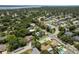 Charming homes nestled within a lush, tree-filled neighborhood, creating a serene and inviting atmosphere at 1 Mandarin Ter, Safety Harbor, FL 34695