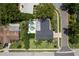 Aerial view showcasing a backyard oasis, complete with a refreshing pool, a manicured lawn, and stylish patio at 1 Mandarin Ter, Safety Harbor, FL 34695