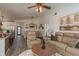 Open-concept living area with modern furnishings, warm tones, and a cohesive design at 1 Mandarin Ter, Safety Harbor, FL 34695