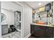 Modern bathroom with a marble shower, vanity, and decorative shelving at 1108 N Franklin St # 502, Tampa, FL 33602