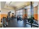 A well-equipped fitness center with cardio machines and weight-training equipment at 1108 N Franklin St # 502, Tampa, FL 33602