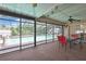Enjoy the outdoors in this spacious screened in patio with a pool view at 11187 Blythville Rd, Spring Hill, FL 34608