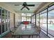 Enjoy the outdoors in this spacious screened in patio with a pool view at 11187 Blythville Rd, Spring Hill, FL 34608