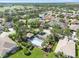 Aerial view of the community, showing home with pool and surrounding area at 1135 Millbrook Cir, Bradenton, FL 34212