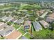 Beautiful aerial view of a community with lake and golf course close by at 1135 Millbrook Cir, Bradenton, FL 34212