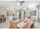 Open-concept dining room with a large dining table at 1135 Millbrook Cir, Bradenton, FL 34212