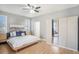 Serene main bedroom with ample natural light and a sliding glass door to the backyard at 1135 Millbrook Cir, Bradenton, FL 34212