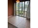 Bright sitting area with tile flooring and views of the surrounding area at 11485 Oakhurst Rd # 1200-214, Largo, FL 33774