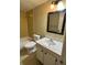 Bathroom with yellow tile and a shower/tub combination at 11485 Oakhurst Rd # 1200-214, Largo, FL 33774