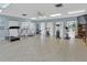 Well-lit gym with an array of cardio and weight machines at 11485 Oakhurst Rd # 1200-214, Largo, FL 33774