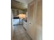 Functional kitchen with white appliances, ample cabinet space, and tile flooring at 11485 Oakhurst Rd # 1200-214, Largo, FL 33774