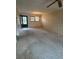 Spacious living area with a ceiling fan and a large window at 11485 Oakhurst Rd # 1200-214, Largo, FL 33774