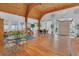 A large, open lobby area with vaulted ceilings, hardwood floors, and comfortable seating at 11485 Oakhurst Rd # 1200-214, Largo, FL 33774