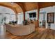 A large, open lobby area with vaulted ceilings, hardwood floors, and comfortable seating at 11485 Oakhurst Rd # 1200-214, Largo, FL 33774