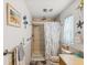 Neutral bathroom with tiled shower and tub combination at 11762 Barb Ct, Seminole, FL 33778