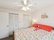 Bedroom featuring a fun flamingo theme and dual closets at 11762 Barb Ct, Seminole, FL 33778