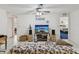 Bright living room with tiled floors and a glimpse into the adjacent bedroom at 11762 Barb Ct, Seminole, FL 33778