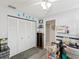 Functional storage room with a large closet and organized shelving units at 11762 Barb Ct, Seminole, FL 33778