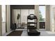 Well-equipped home gym featuring a treadmill, weight rack, and mirrored wall for effective workouts at 18469 Serene Lake Loop, Lutz, FL 33548