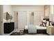 Modern bedroom with contemporary dresser, sliding door closets, and soothing gray tones at 18469 Serene Lake Loop, Lutz, FL 33548