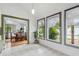 Bright breakfast nook with multiple windows and a view of the backyard at 18914 Geraci Rd, Lutz, FL 33548