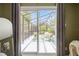 Views of the outdoor screened porch with comfortable seating, perfect for relaxing at 18914 Geraci Rd, Lutz, FL 33548
