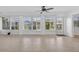 Sunroom featuring tile floors and natural light at 205 Wimbly Pl, Sun City Center, FL 33573