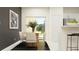 Cozy dining area with modern table, chairs, and sliding glass doors for natural light at 210 Se 27Th St, Ruskin, FL 33570