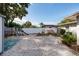 Well-maintained backyard featuring a playset and flourishing raised garden beds at 2135 Pocahontas Dr, Largo, FL 33774