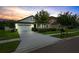 Charming single-Gathering home with a well-manicured lawn and a two-car garage at 21395 Southern Charm Dr, Land O Lakes, FL 34637