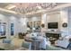 Well-appointed community lounge area with plush seating, fireplace, and elegant decor at 2388 Oakwood Preserve Dr, Wesley Chapel, FL 33543