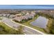 Lovely community with well-maintained homes surrounding a peaceful lake, offering serene views at 2388 Oakwood Preserve Dr, Wesley Chapel, FL 33543