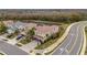 Beautiful two-story home with tile roof, well-maintained landscaping, and proximity to a serene lake at 2388 Oakwood Preserve Dr, Wesley Chapel, FL 33543
