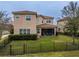 Back of home featuring a covered patio and a fenced in yard at 2388 Oakwood Preserve Dr, Wesley Chapel, FL 33543