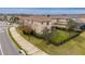 Backyard with a black metal fence and a screened-in porch that offers shade and privacy at 2388 Oakwood Preserve Dr, Wesley Chapel, FL 33543