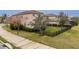 Well-maintained backyard with a lawn, and a black metal fence at 2388 Oakwood Preserve Dr, Wesley Chapel, FL 33543