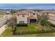Home featuring a fenced backyard and a screened-in patio perfect for relaxing and entertaining at 2388 Oakwood Preserve Dr, Wesley Chapel, FL 33543