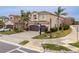 Beautiful two-story home featuring a paver driveway, an attached two-car garage, and lovely landscaping at 2388 Oakwood Preserve Dr, Wesley Chapel, FL 33543