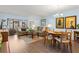Inviting living room with comfortable seating and an open layout to the dining area at 2400 Winding Creek Blvd # 4-101, Clearwater, FL 33761