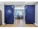 Hallway with ample storage space and a view into the adjacent home office at 2475 Bay Berry Dr, Clearwater, FL 33763