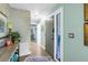 Inviting front hallway features wood flooring, serene paint color, and leads into the living areas at 2475 Bay Berry Dr, Clearwater, FL 33763