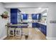 Open concept kitchen with updated appliances, custom cabinetry, and a light and airy feel at 2475 Bay Berry Dr, Clearwater, FL 33763