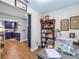 Home office featuring custom blue cabinets and a view into the updated kitchen at 2475 Bay Berry Dr, Clearwater, FL 33763