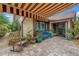 Inviting patio with comfortable seating, vibrant potted plants, and a charming bench, perfect for enjoying the outdoors at 2475 Bay Berry Dr, Clearwater, FL 33763