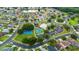 An aerial view of the community highlighting the pool, playground, and basketball courts at 25521 Bruford Blvd, Land O Lakes, FL 34639