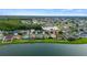 Picturesque aerial view of waterfront homes nestled around a lake, offering serene suburban living at 25521 Bruford Blvd, Land O Lakes, FL 34639