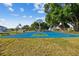 Community basketball court with green and blue surfaces for neighborhood recreation at 25521 Bruford Blvd, Land O Lakes, FL 34639