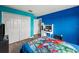 Bedroom with bed, wardrobe, and decor at 25521 Bruford Blvd, Land O Lakes, FL 34639